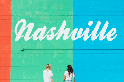 A blue and green mural located in one of the top areas in Nashville.